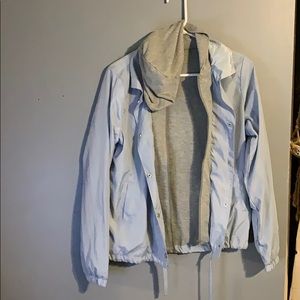 blue windbreaker with built in grey hoodie